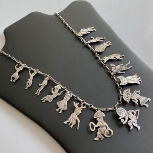 NATIVE AMERICAN STERLING FETISH NECKLACE - PEOPLE & ANIMALS